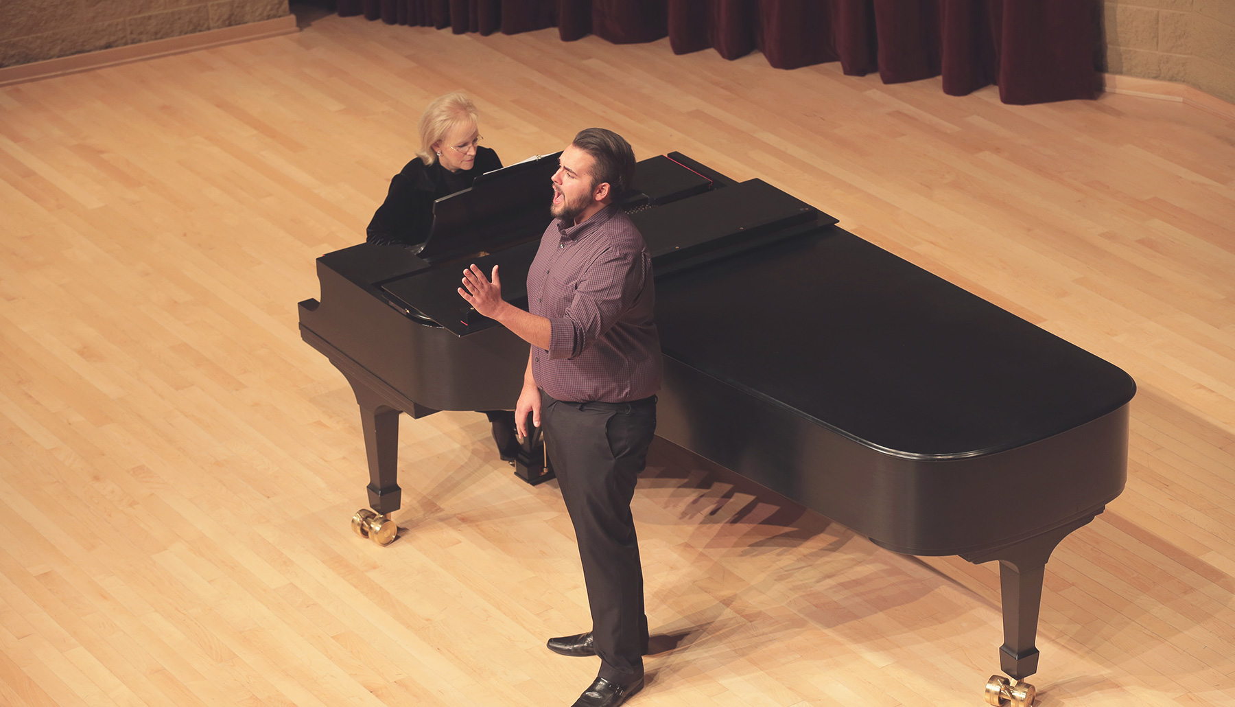 a male singer with a female accompanist