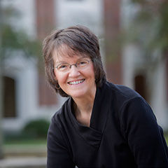 Christie Franklin with a building in the background.